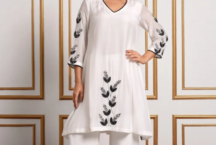 Detailing black lace neckline trim and intricate floral leaf embroidery on Onyx Petal co-ord set by Embrowhite