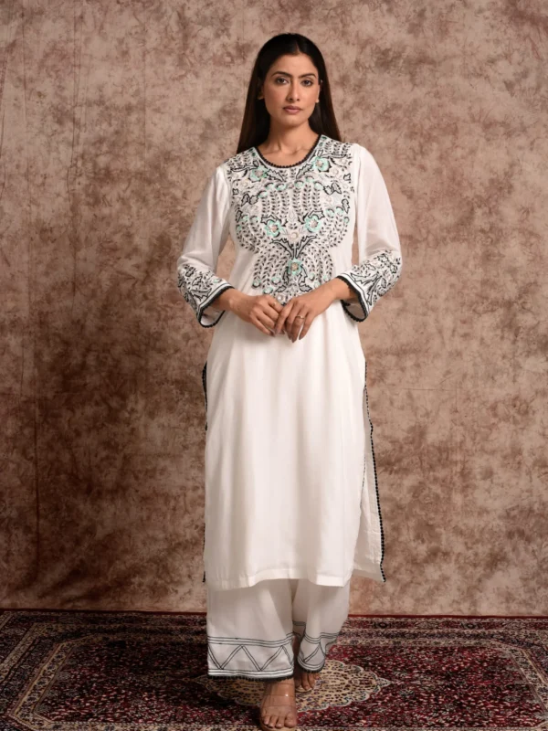 Full-length catalog pose of Aurelia sun-kissed ivory long kurta with pastel embroidered chest panel and matching palazzo pants by Embrowhite