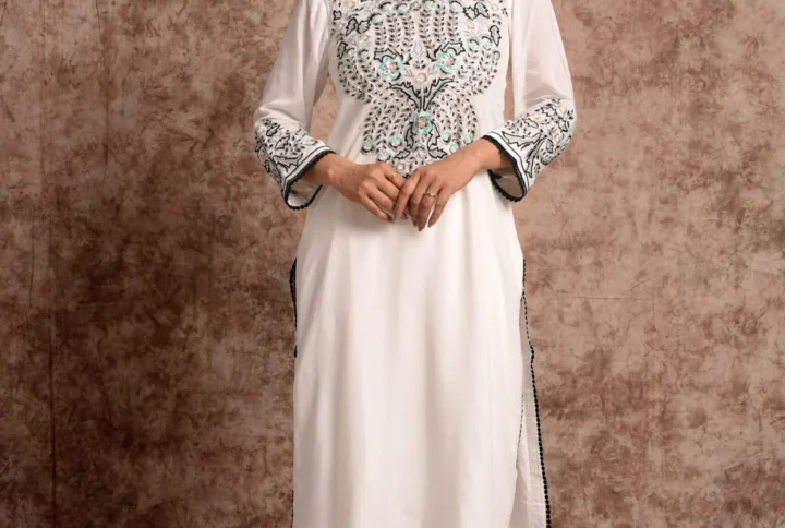 Full-length catalog pose of Aurelia sun-kissed ivory long kurta with pastel embroidered chest panel and matching palazzo pants by Embrowhite