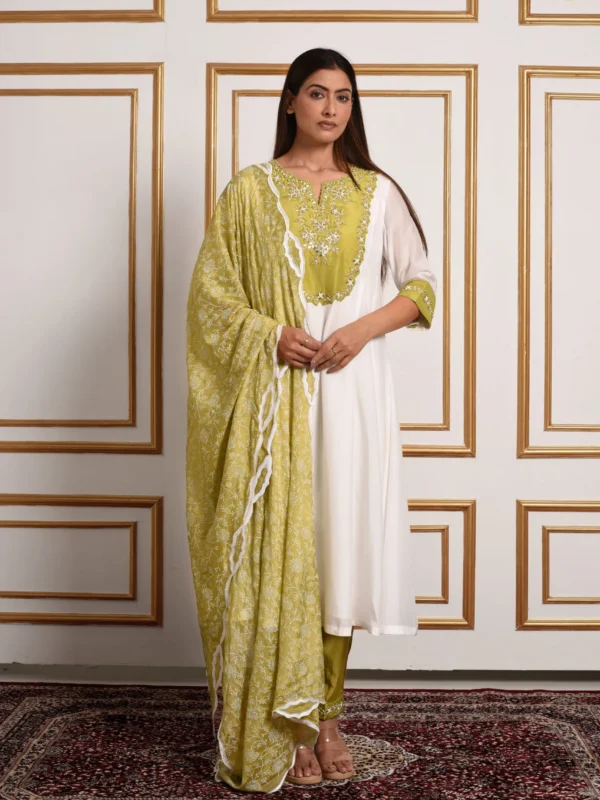 Full-length front view of Gulistan ivory suit set with olive floral printed dupatta and embroidered yoke by Embrowhite