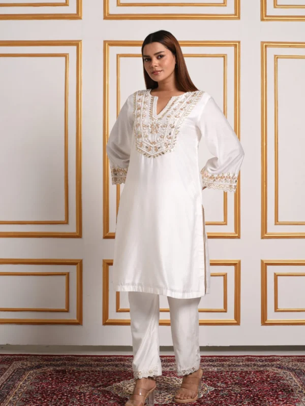 EmbroWhite ivory straight kurta set with embroidered sleeve cuff details