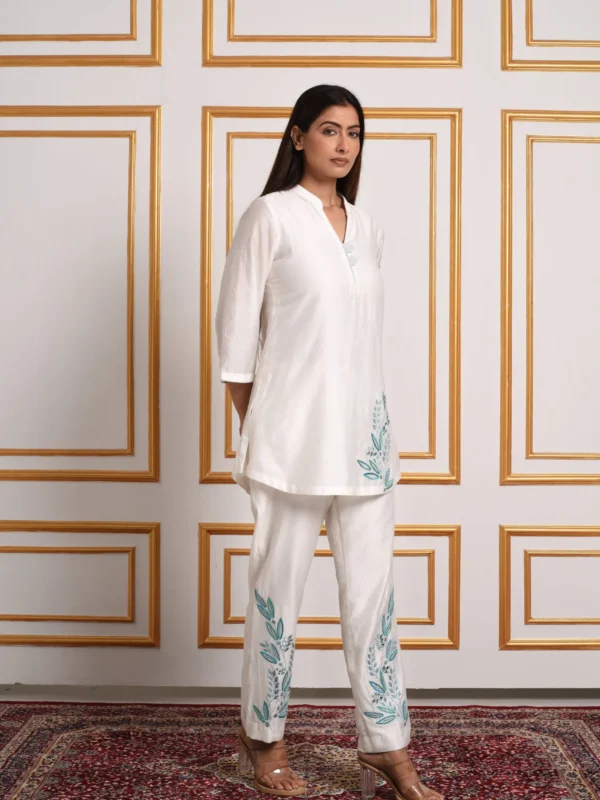 Front pose of model in Ethereal White & Blue Floral Embroidered Co-ord Set by Embrowhite