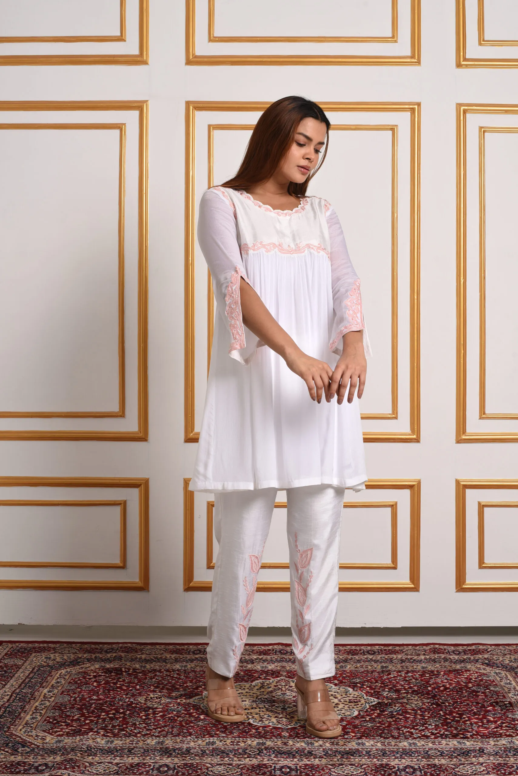 Full front view pose of model wearing EmbroWhite Inara Roseate Scallop Co-Ord Set Full front view pose of model wearing EmbroWhite Inara Roseate Scallop Co-Ord Set