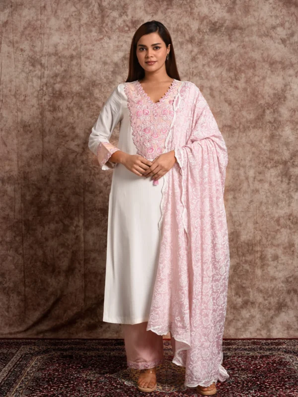 Full-length front view of Inara white straight kurta set with pink embroidery and printed dupatta by Embrowhite