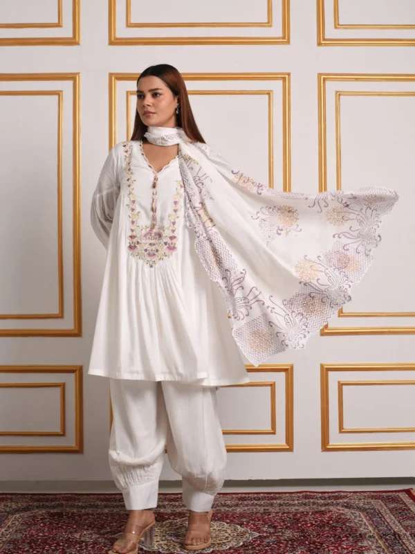 Full-length shot showing flowing printed dupatta worn with Meher white embroidered dhoti kurta set by Embrowhite