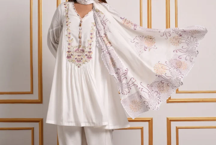 Full-length shot showing flowing printed dupatta worn with Meher white embroidered dhoti kurta set by Embrowhite