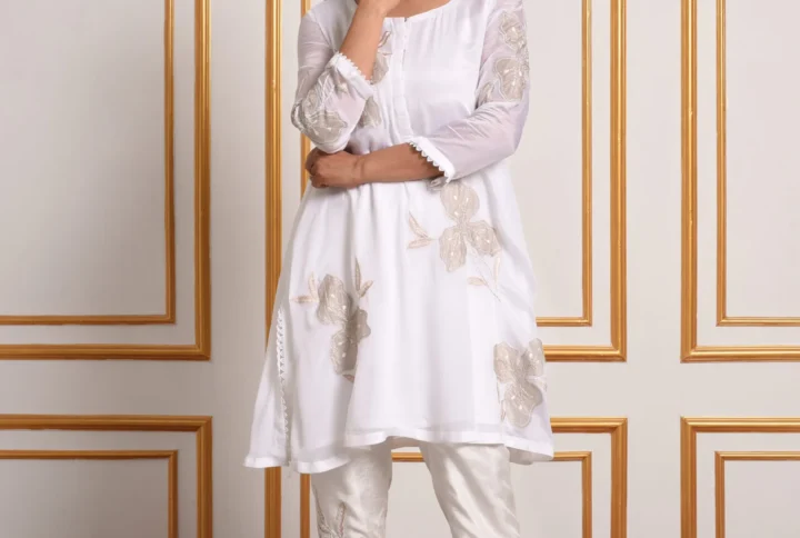 Full-length view of model posing in Pastel Mosaic white short tunic co-ord set with matching embroidered pants