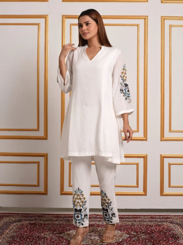 Three-quarter full-length shot of Liana pastel swirl embroidered co-ord tunic and trouser set by Embrowhite
